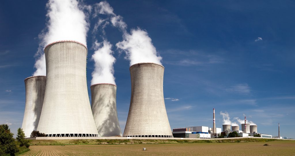 Power plant control room using NX-ERA Xpress PLC for boiler safety and performance monitoring