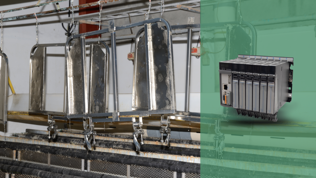 PLC-controlled robotic arm handling parts in coating plant